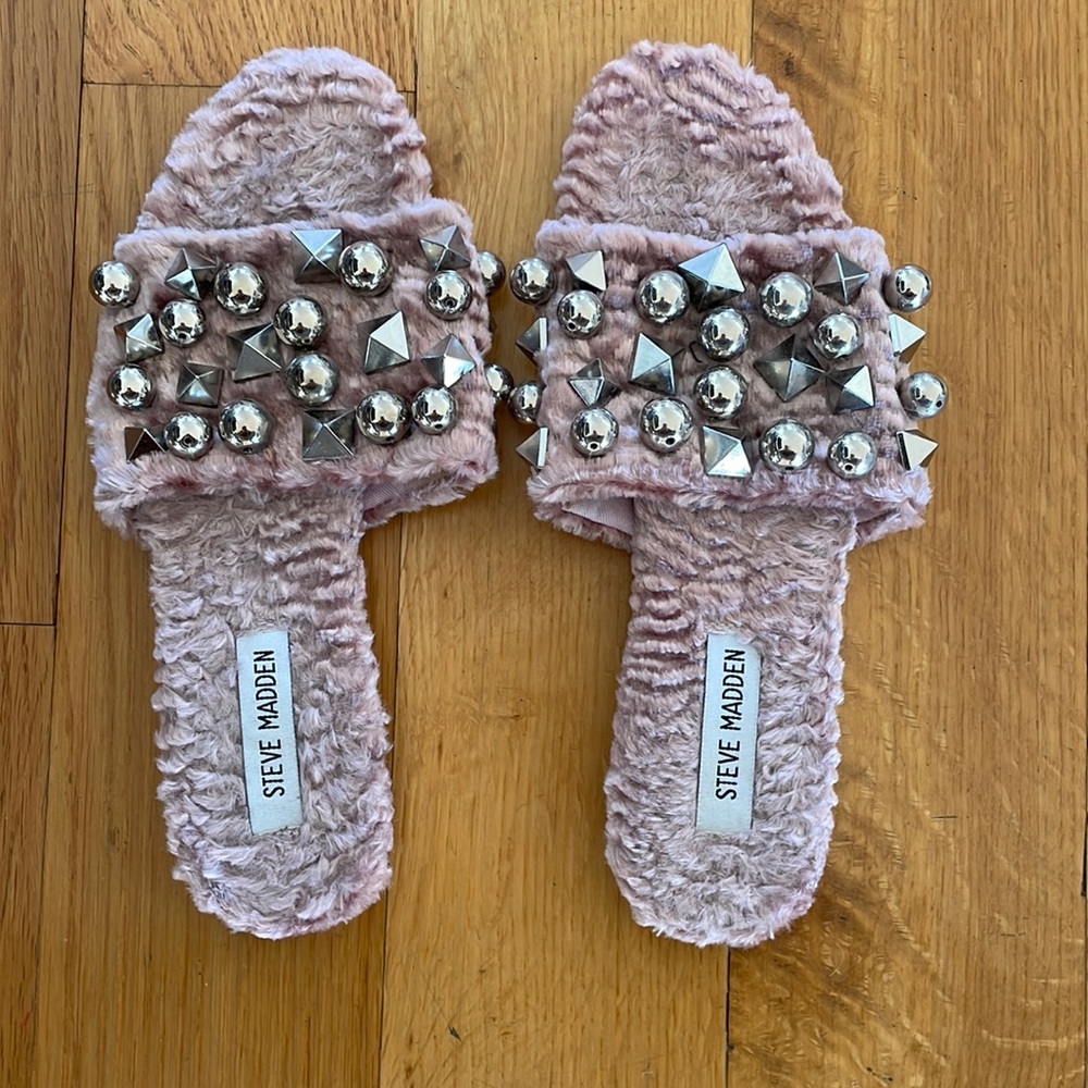Steve Madden fur sandals with bolt design.